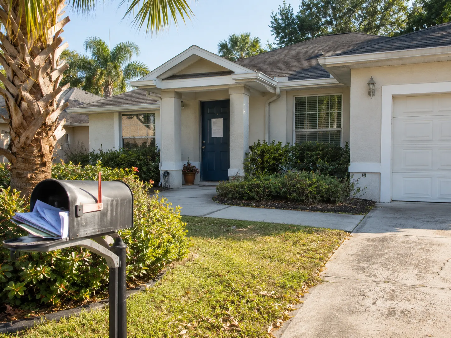 Jacksonville homeowner reviewing pre-foreclosure paperwork and mortgage documents